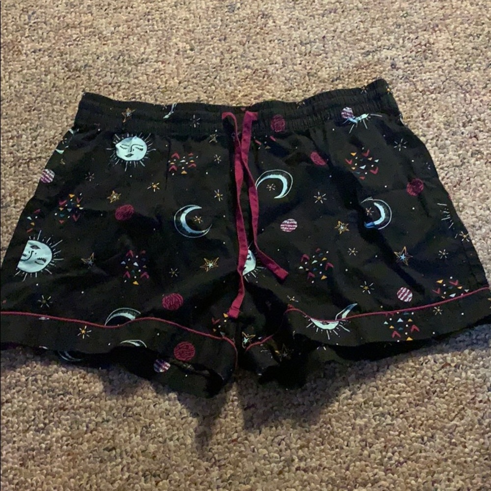 Black moon, stars, sun shorts